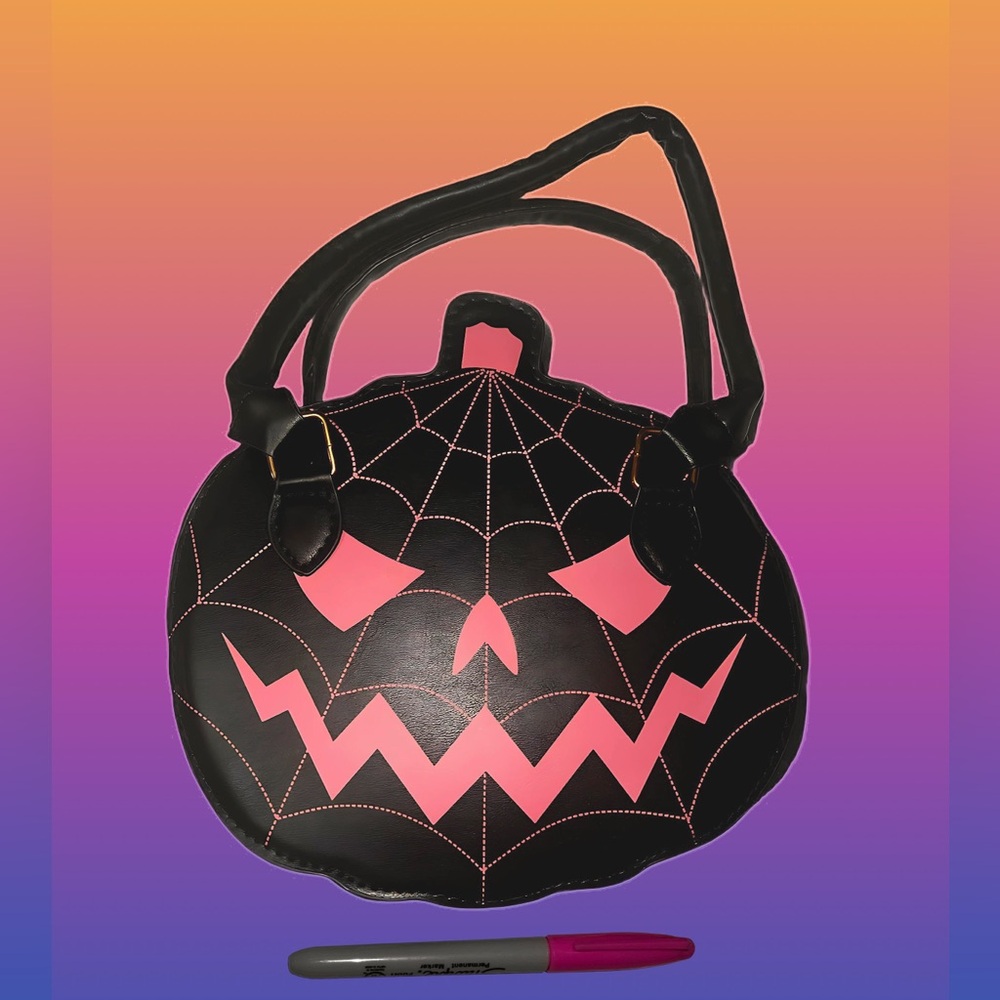 Brand new baby pink and black pumpkin purse